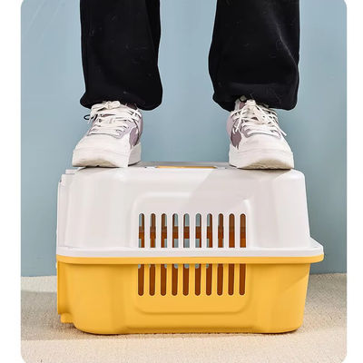 Caja de transporte aéreo para perros al aire libre con cierre de botón de construcción de plástico duradero